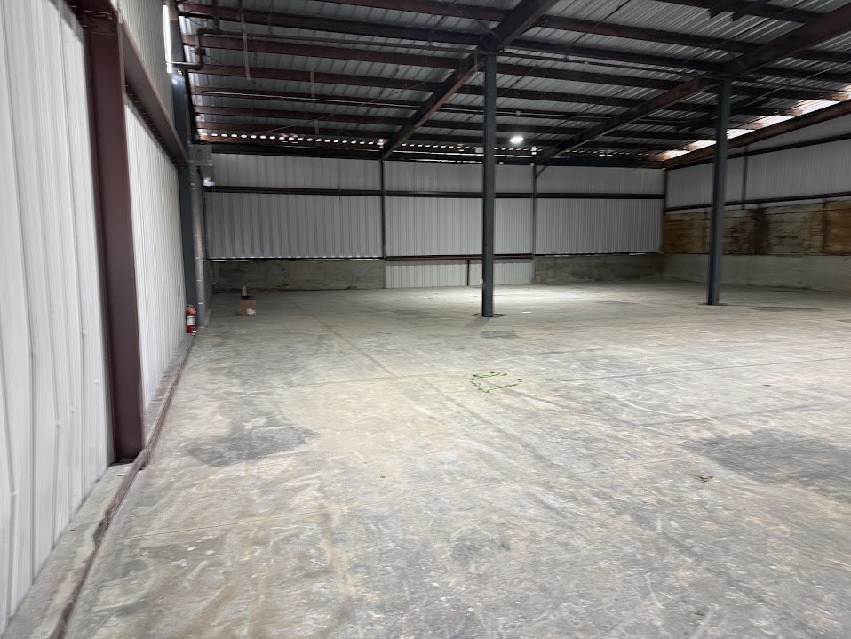 Large finished concrete floor inside an industrial building